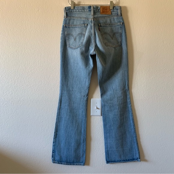 Levis Strauss Ripped High Rise Boot Cut Jeans Medium Wash Size 25 - Picture 6 of 11
